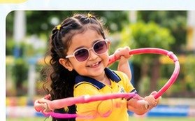 Child playing a hoop movement game